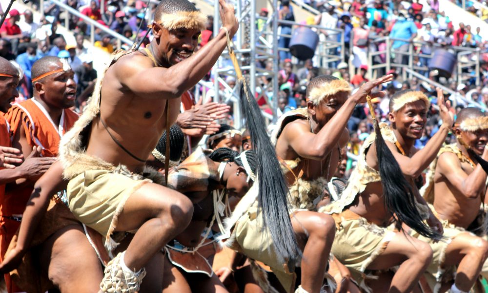 Traditional Zimbabwean Dancers Performing at a Cultural Event, Showcasing the Nation's Rich Heritage and Vibrant Spirit.
