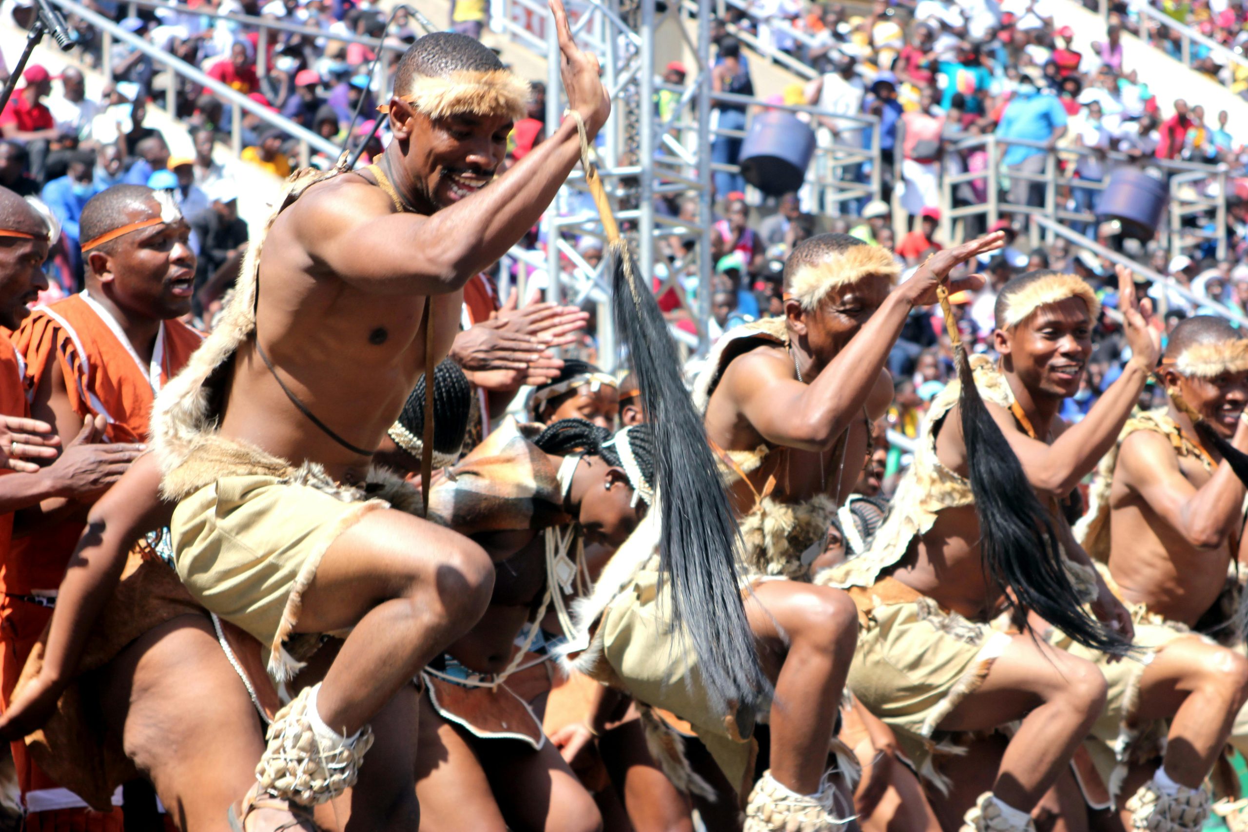 Traditional Zimbabwean Dancers Performing at a Cultural Event, Showcasing the Nation's Rich Heritage and Vibrant Spirit.