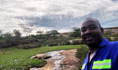 Nelson Chamisa visiting a serene countryside location, embracing grassroots connection with nature.